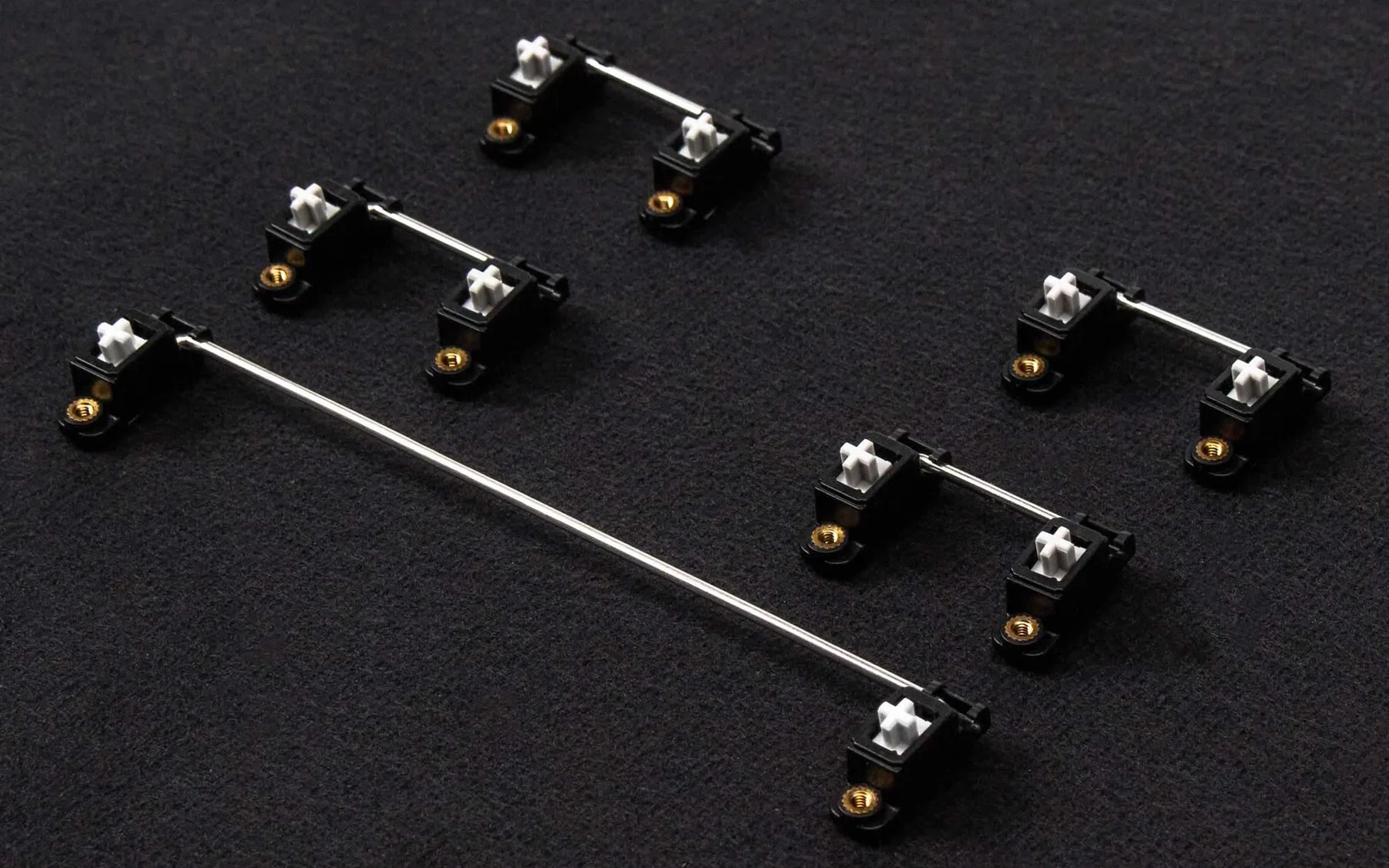 Screw-in PCB stabilizers under the long keys